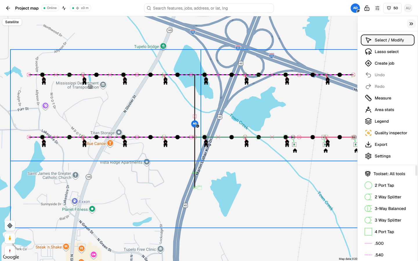 Drawing a line feature on the map with the tool palette open and the attribute panel filling in.